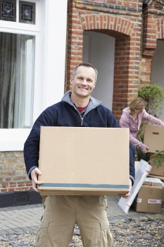 Removal van and moving boxes in Hornsey residential street