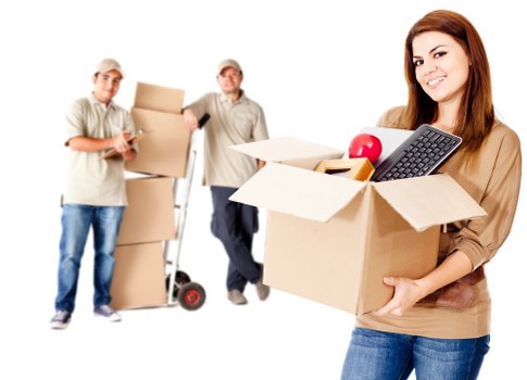 House removal team carrying boxes in Hornsey