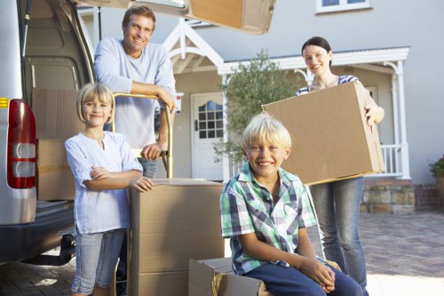 Moving team handling household items during a UK man and van service