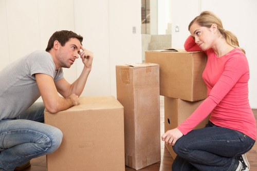 Packed student boxes and small furniture ready for a Hornsey move