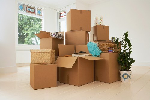 Packing and moving assorted furniture items for delivery