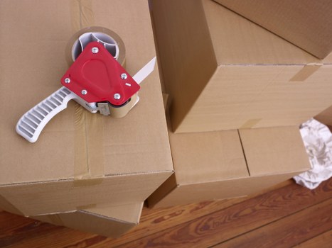 Careful removal of sofas and wardrobes from a Hornsey property